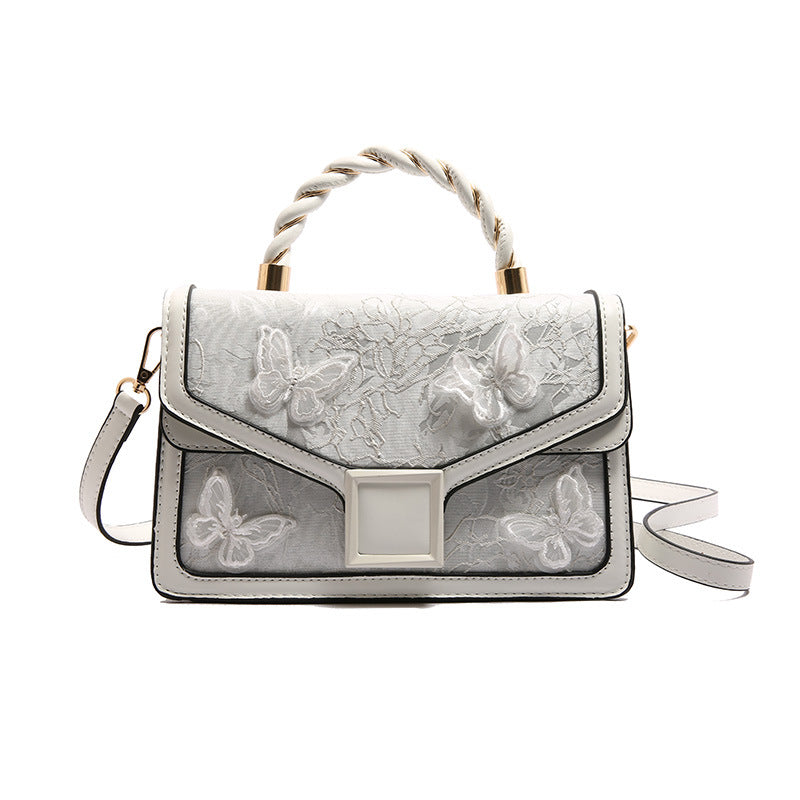 De Whisper Butterfly Handtas