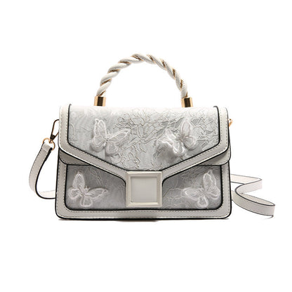 De Whisper Butterfly Handtas