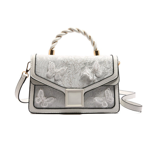 De Whisper Butterfly Handtas