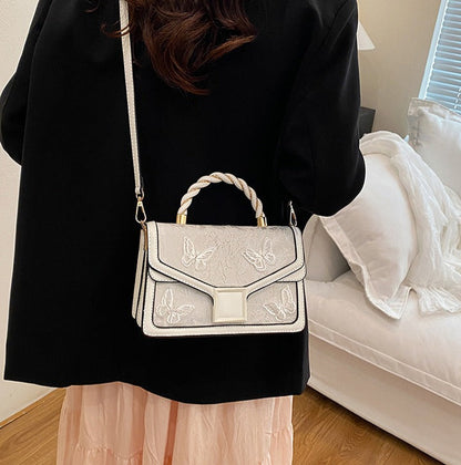 De Whisper Butterfly Handtas