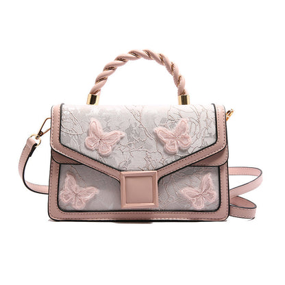 De Whisper Butterfly Handtas