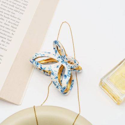 De Flutter Metal Vlinder Clip